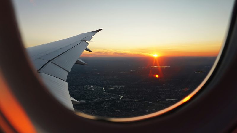 View of sunset through aircraft window